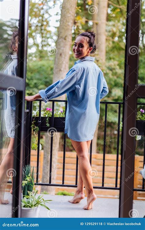Delighted Asian Woman Standing On The Balcony Stock Photo Image Of Balcony Calm