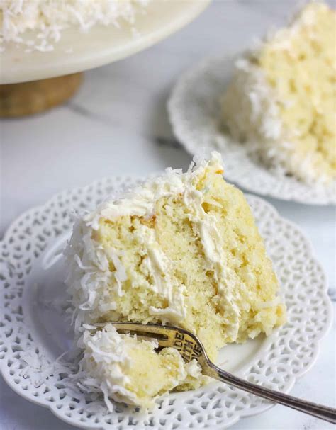 The Best Coconut Cake With Icing Ever Easy Moist