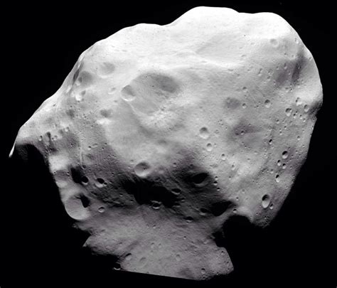 An Object That Looks Like A Rock With Water On It S Surface In Black And White