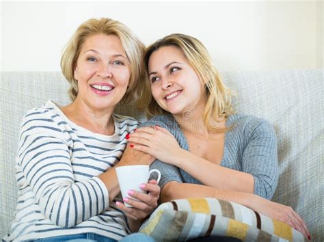 Portrait Of Happy Mature Mother And Young Daughter At Home Stock Image Image Of People
