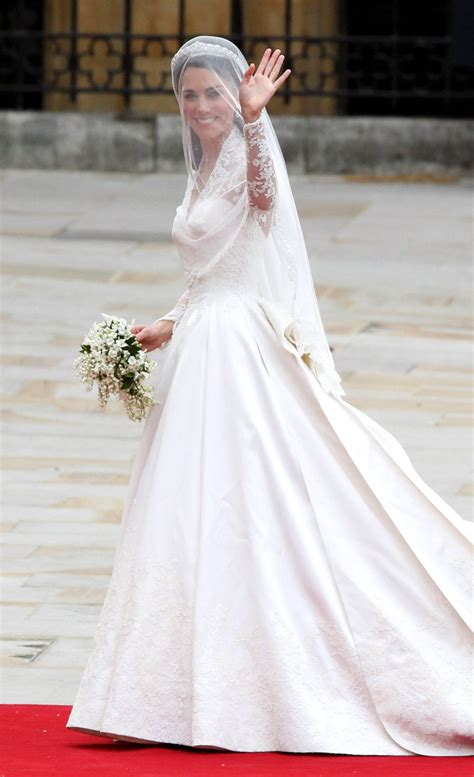 Burton designed the bottom of the dress to resemble an opening flower. Kate Middleton Wedding Dress Entails Interesting Flower Motifs - Wedding and Bridal Inspiration