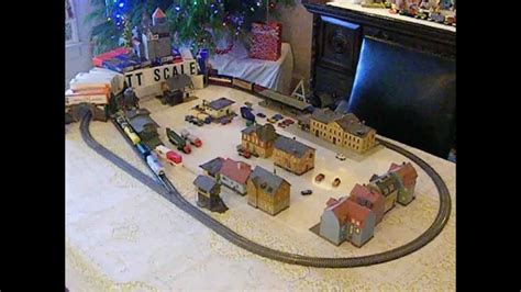 It includes a generous composite wood table with cafe rounded corners and a 1 ½ inch lip to keep toys on the table. TT scale Classic Table Top Christmas train layout set ...