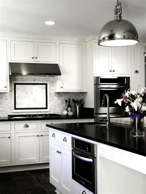 Located in miami florida and serving clients all over the u.s, canada and the caribbean since 1998. Black Countertop And White Cabinets Home Design Ideas ...