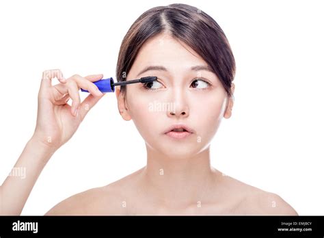 Young Woman Putting On Mascara Hi Res Stock Photography And Images Alamy