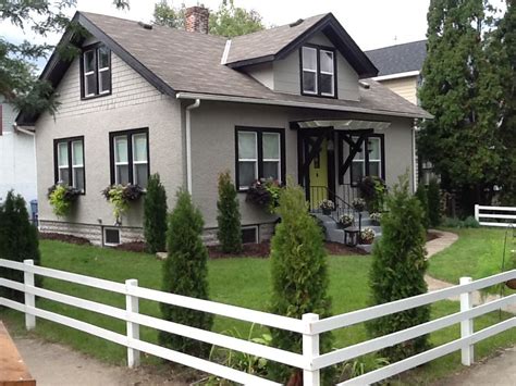 House black windows white trim. Remodeled 1918 craftsman home, black trim, taupe exterior ...
