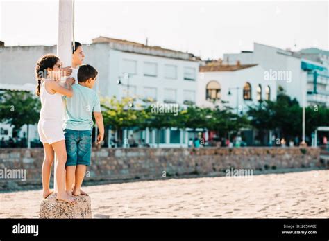 Three Kids Having Fun On The Beach Summer Time Stock Photo Alamy