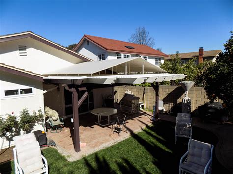 Patio 4'wx16'l brown upgraded retractable pergola canopy replacement shade cover slide on wire canopy pergola shade cloth awning roof wave shade deck trellis porch. Check out this unique installation we did of a Sloped ...