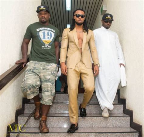 Hotness Singer Flavour Steps Out In A Complete Suit Without A Shirt