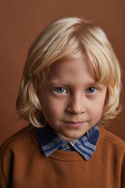 Premium Photo Portrait Of Little Boy With Long Blonde Hair Looking
