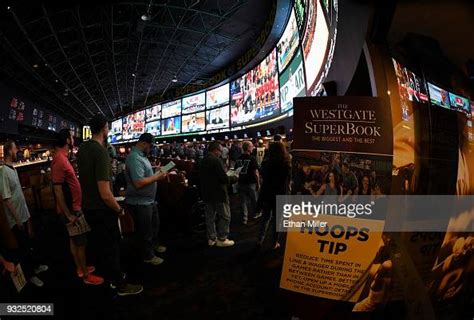 Guests Line Up To Place Bets As They Attend A Viewing Party For The