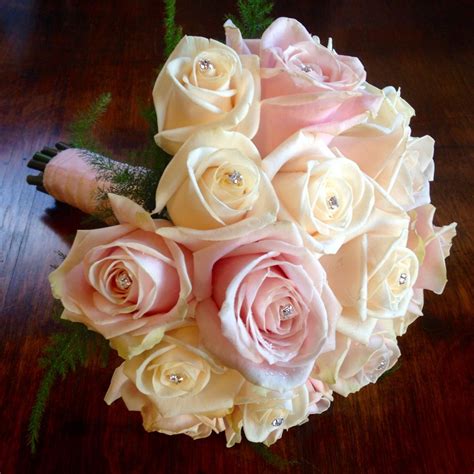 Brides Hand Tied Bouquet Of Sweet Avalanche And Vendela Roses