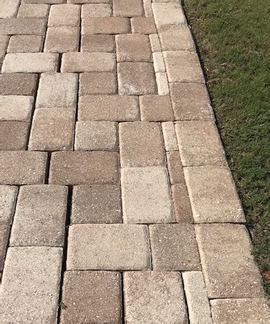 Follow the tutorial to see how to do it. Paver driveway retaining edging - DoItYourself.com Community Forums