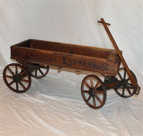 Its material is walnut wood. Bargain John's Antiques | Wooden Child's Express Coaster ...