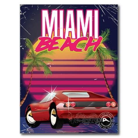 a red car parked on top of a beach next to palm trees and the words miami beach