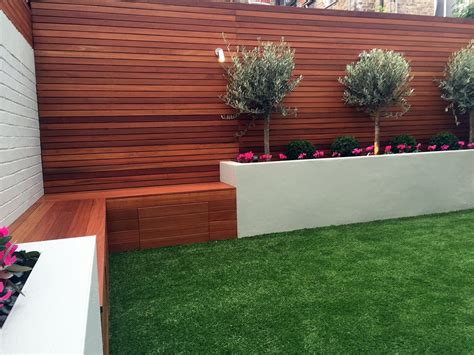 Image result for synthetic grass courtyard | Small ... The owners of this home chose to carve out space in their slope to create a sunken brick patio.