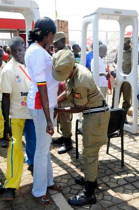 Photos Of Ugandan Police ‘fondling Women In The Name Of Security Checks