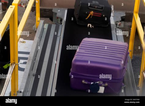 Bags Trolley Luggage Loading On Airplane Stock Photo Alamy
