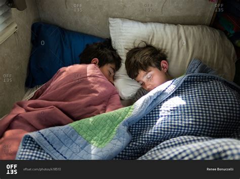 Two Teen Boys Asleep In A Bed Stock Photo Offset