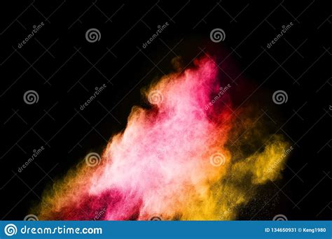 Abstract Colored Dust Explosion On A Black Background Stock Image