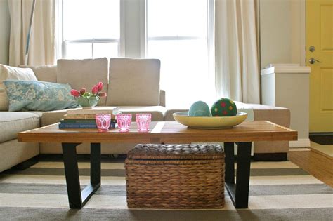 Place a large woven box under the table to use it for closed storage comfortably. How to Use Decorative Baskets in Your Home Décor