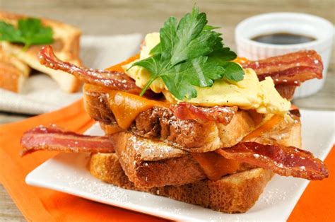 Bacon And French Toast Club Sandwich With Scrambled Eggs Powdered