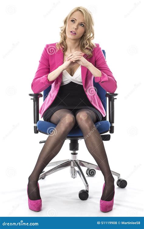 Business Woman Thinking Wearing Pink And Sitting In An Office Chair