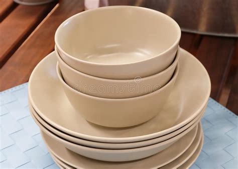 Stack Of Brown Round Plates Stock Photo Image Of Dishware Flatware