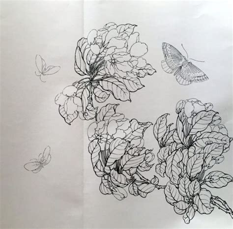 Two Butterflies Flying Over Some Flowers On A Sheet Of Paper With Black And White Ink