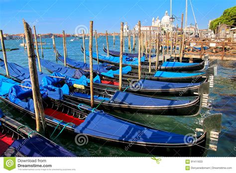 Gondolas Moored Near Piazza San Marco In Venice Italy Stock Image