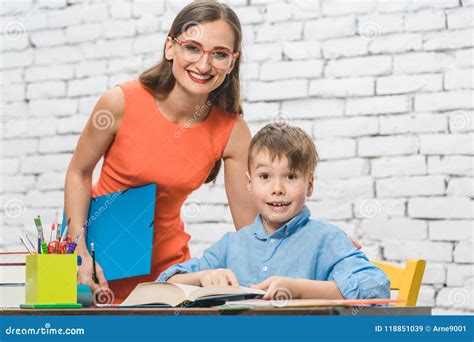 Teacher And Pupil Doing Task Together Stock Image Image Of Student