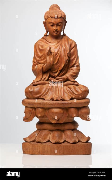 Buddha Statue Carved Wooden Buddha Sitting In Meditation On A Lotus