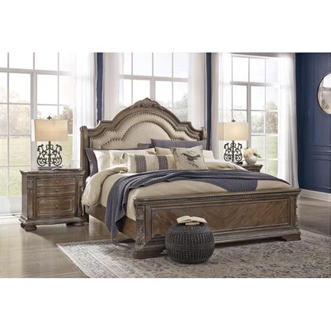 Returns are not excepted by the company after 30 days. B803-57 Ashley Furniture Charmond Queen Upholstered Sleigh Bed