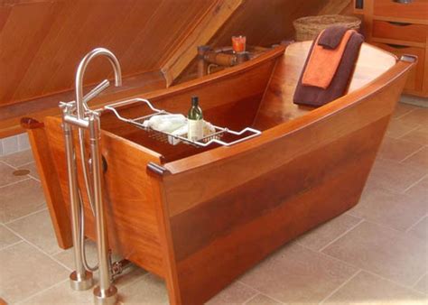 It matches perfectly with modern minimalism as well as with classic decor. 15 Awe-Inspiring Bathrooms with Wooden Bathtub - Rilane