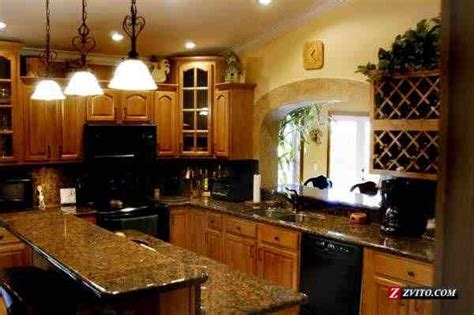 Uba tuba granite fabricated with a half bullnose edge installed on light wood cabinets with a 50/50 sink. Autumn cabinets with black (uba tuba) granite counter | Black appliances kitchen, Kitchen ...