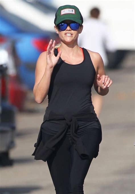 reese witherspoon in tights out jogging in brentwood hawtcelebs