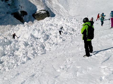 Switzerland Avalanche Rescuers Hunt For Buried Skiers In The Alps
