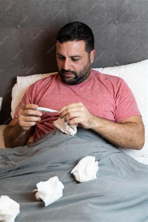 Premium Photo Middle Aged Man In Bed Sick With Flu Symptoms