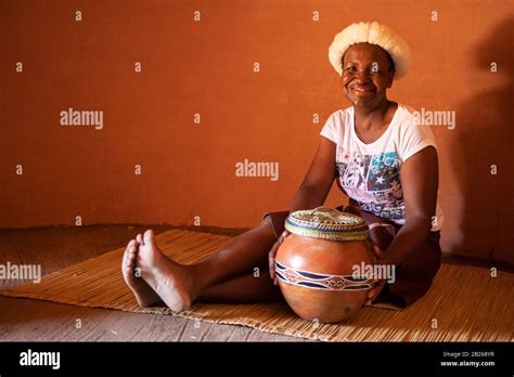 Basotho Woman In A Traditional Hut Thaba Bosiu Cultural Village Lesotho Stock Photo Alamy