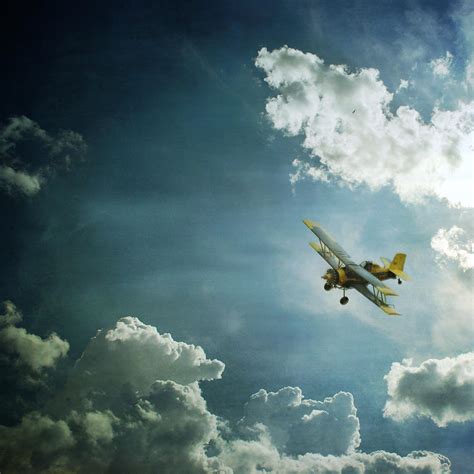 Plane Flying Through Clouds Photograph By Moosebitedesign Pixels