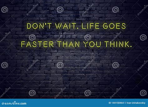 Positive Inspiring Quote On Neon Sign Against Brick Wall Dont Wait Life