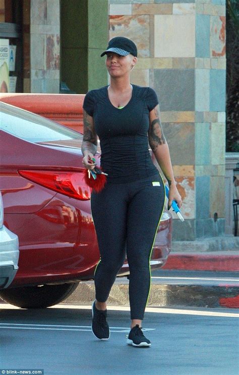 Amber Rose Shows Off Her Pert Derriere And Voluptuous Curves Amber