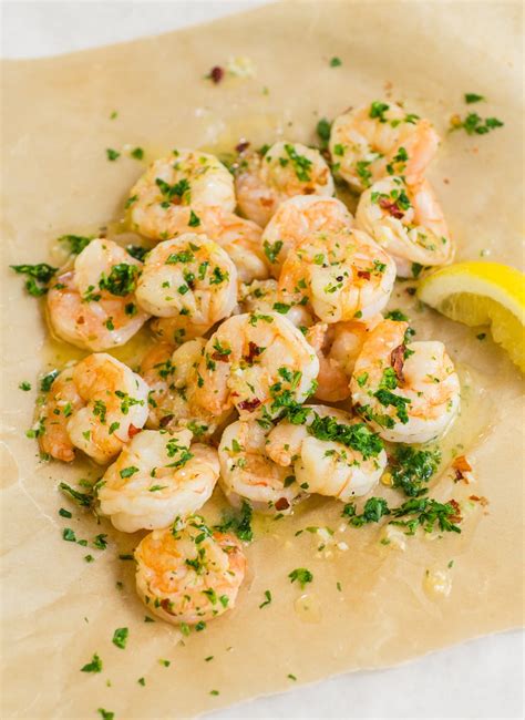 While you cook the pasta, sauté the shrimp with butter and garlic ( at least 3 minced cloves), then add wine. Recipe: Roasted Shrimp Scampi | Kitchn