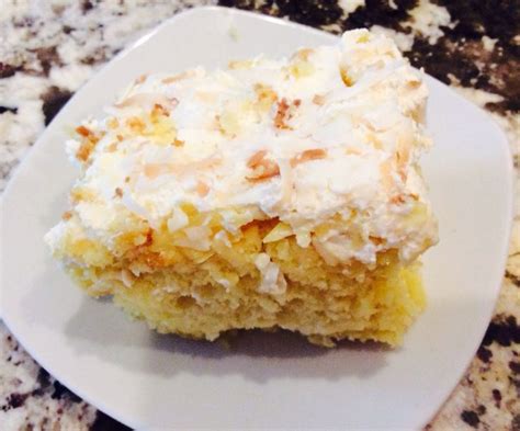 This cool and creamy coconut poke cake starts with a simple white cake and then drenched with sweet coconut pudding. Coconut Pineapple Poke Cake | Recipe | Pineapple poke cake ...
