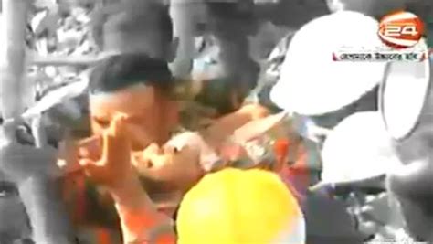 bangladesh factory collapse watch moment woman is pulled alive from rubble after being trapped