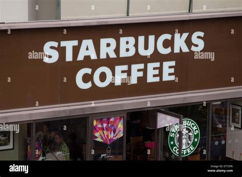 Starbucks Coffee Sign At Tower Bridge London Stock Photo Alamy