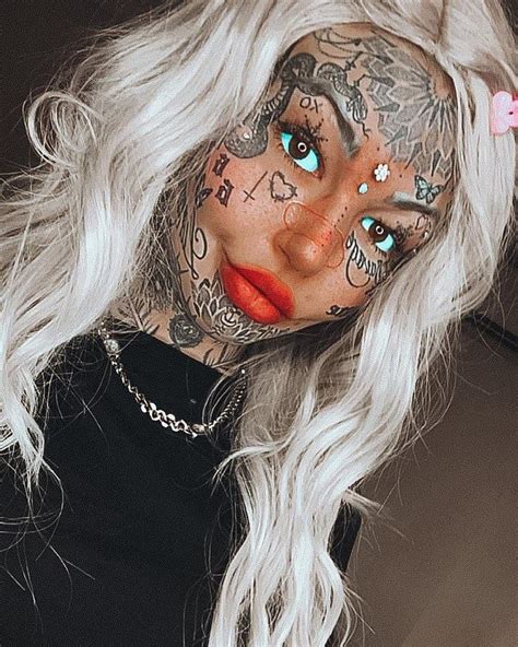Amber Luke Who Has Spent 50k On 600 Tattoos Covers Them Up To See How She Looks Daily Mail