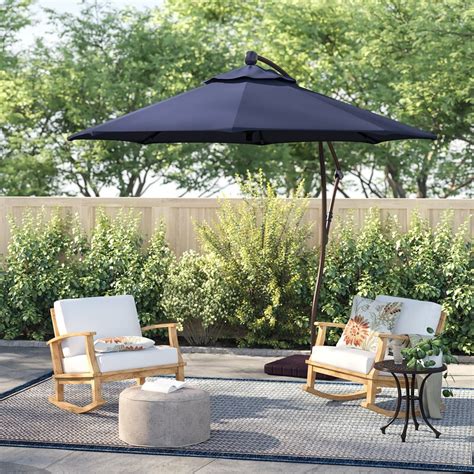 This outdoor offset patio umbrella with cantilever and crank will add the perfect shaded space to your patio or yard. Sol 72 Outdoor™ Cantilever Umbrella & Reviews | Wayfair