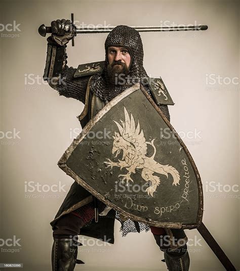 Medieval Knight With Sword And Shield Stock Photo - Download Image Now ...