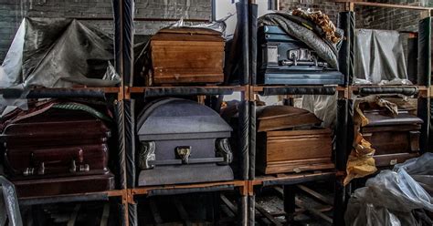 Inside Creepy Abandoned Funeral Home With Rotting Chapel Open Coffins And Dusty Hearse Mirror