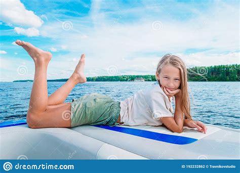 Little Girl Sailing On Boat In Clear Open Sea Stock Photo Image Of